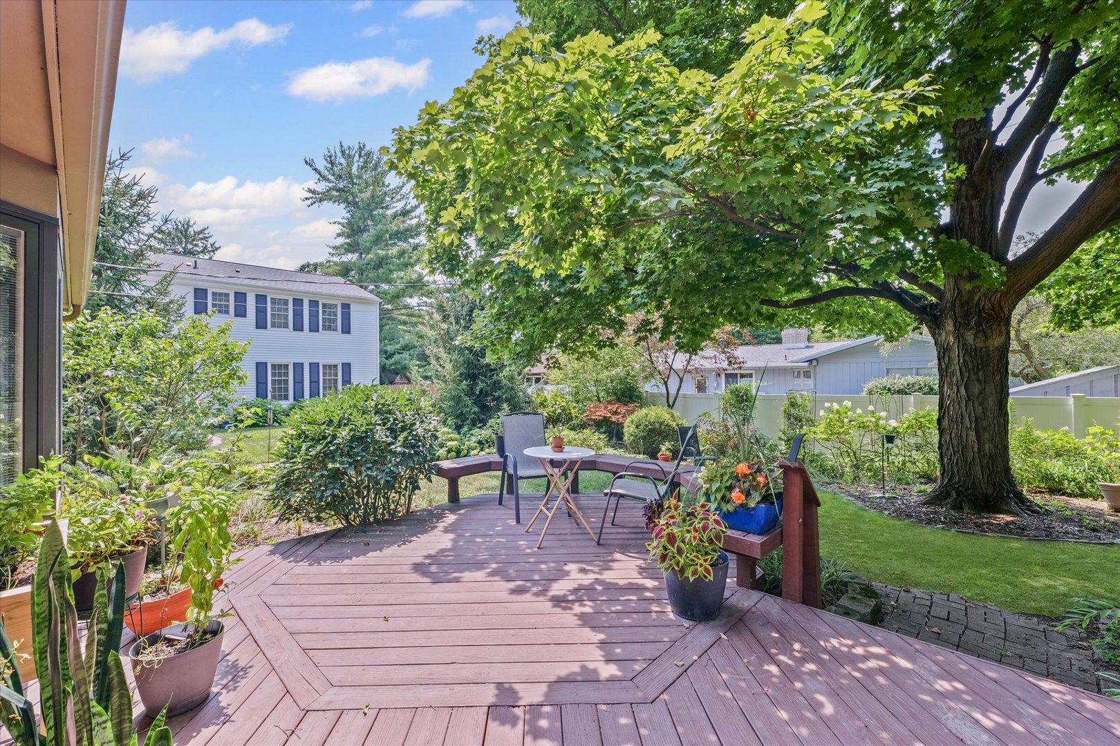 2119 Galen Drive Champaign, IL 61821 - Photo 38 of 39 a view of a chairs and table in backyard
