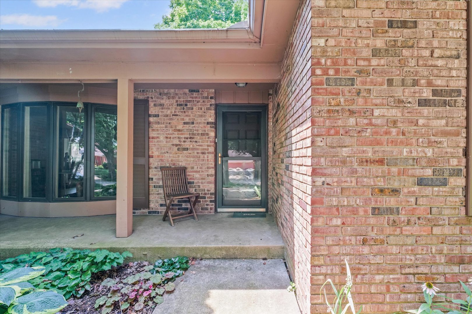 2119 Galen Drive Champaign, IL 61821 - Photo 4 of 39 a front view of a house with a porch