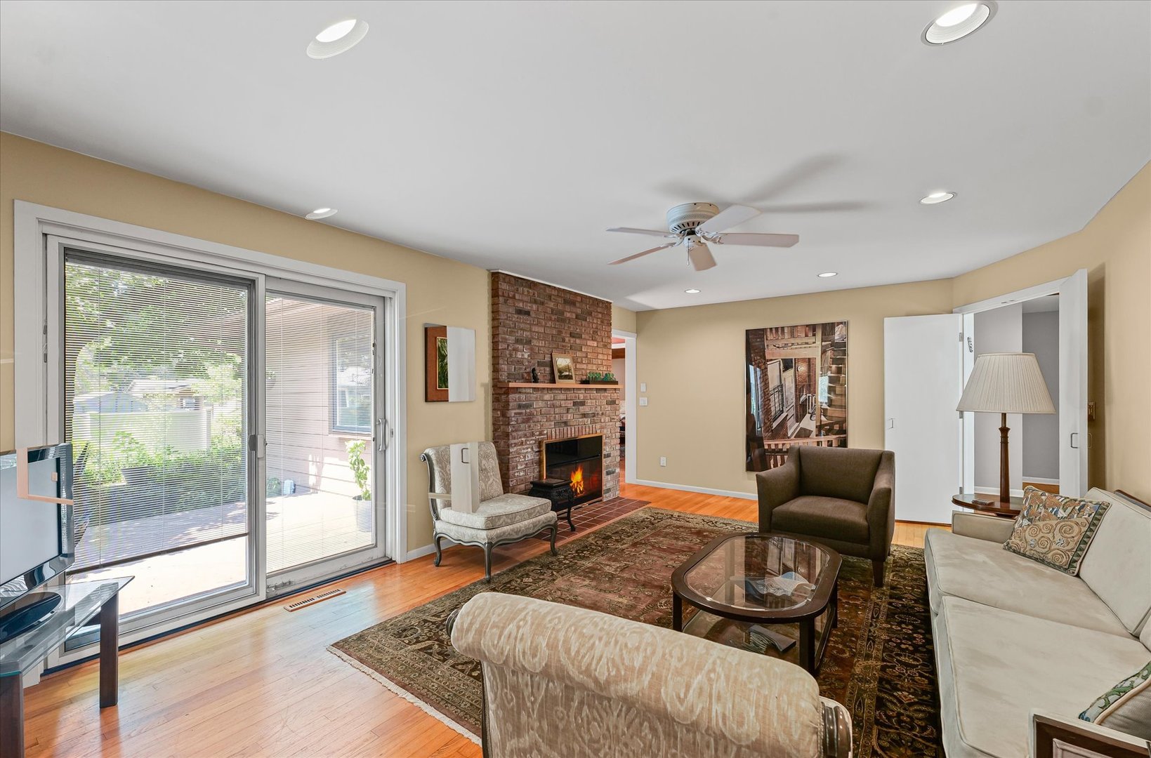 2119 Galen Drive Champaign, IL 61821 - Photo 6 of 39 a living room with furniture large window and a fireplace