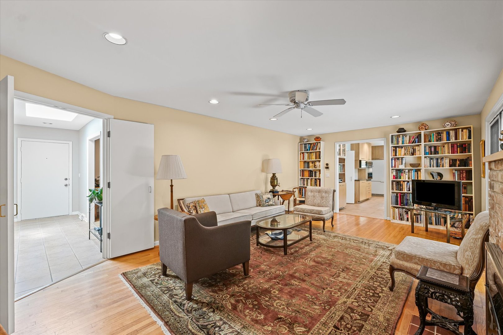 2119 Galen Drive Champaign, IL 61821 - Photo 8 of 39 a living room with furniture and a flat screen tv