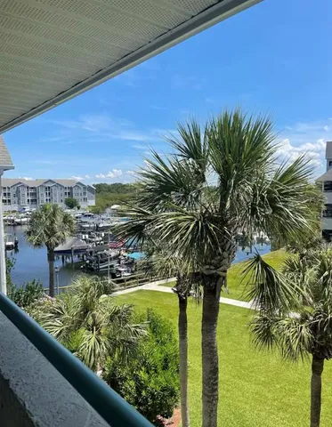 a view of swimming pool from a balcony