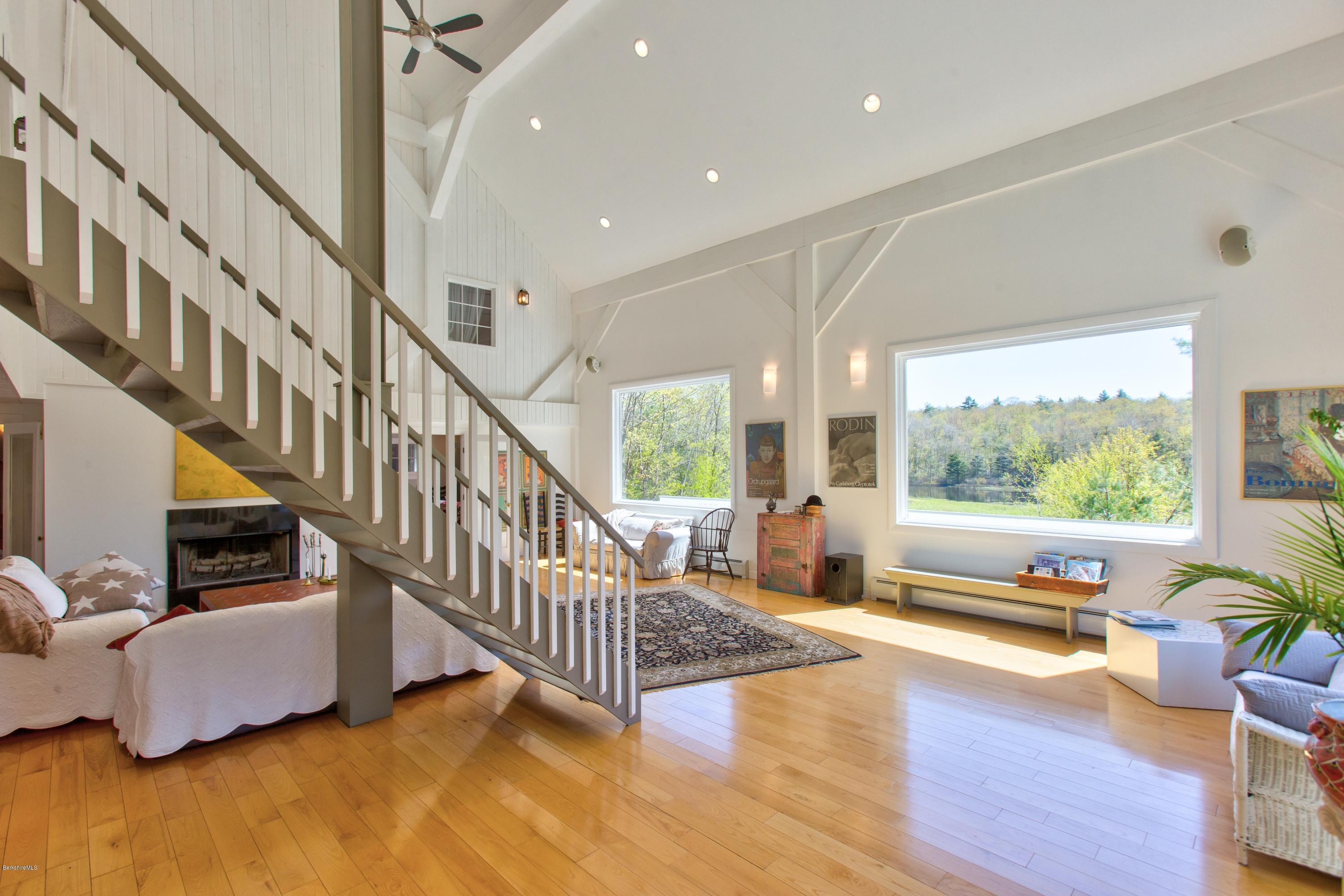 49 New Hartford Road Sandisfield, MA 01255 - Photo 15 of 41 a living room with furniture and a large window