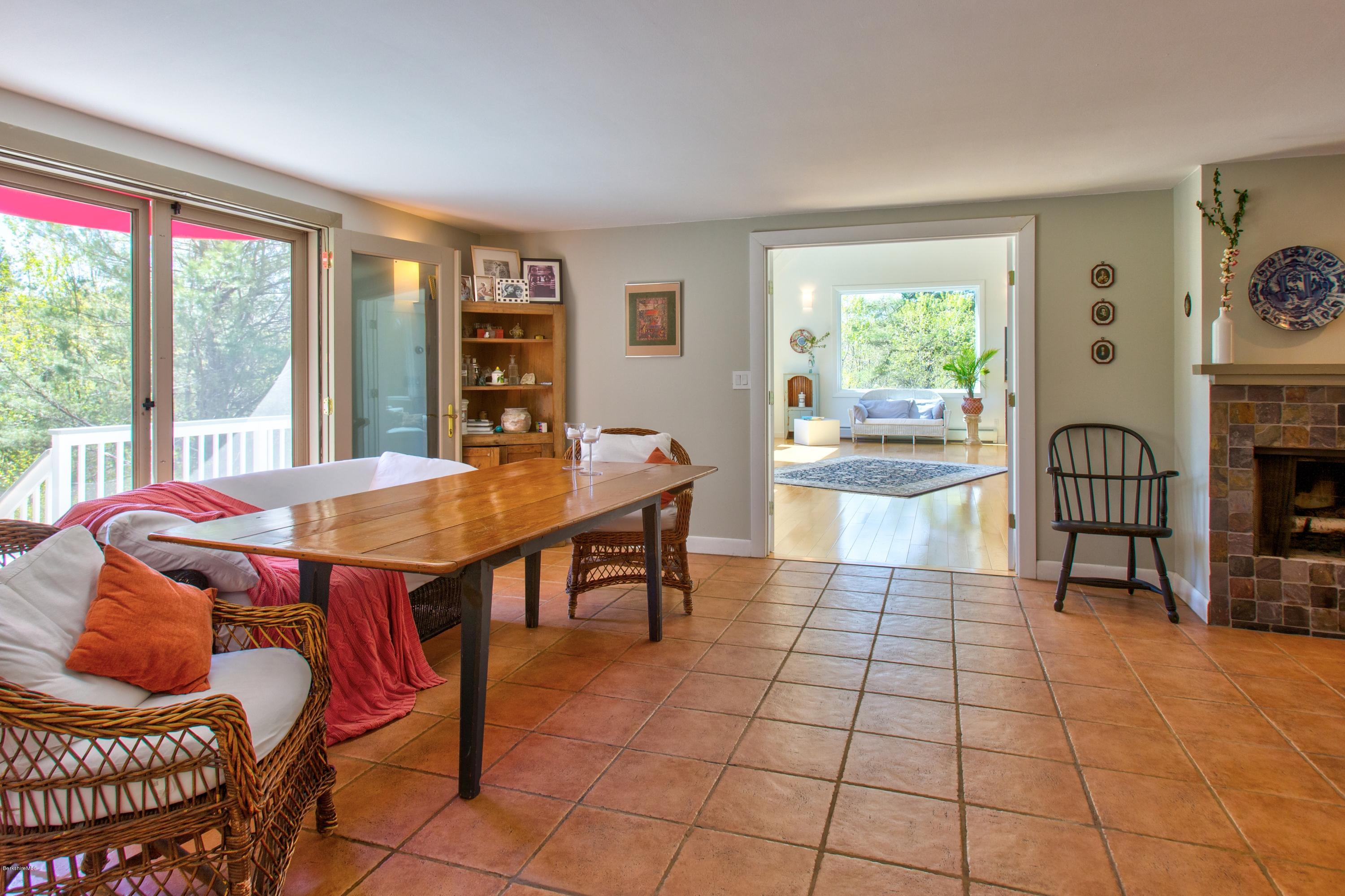 49 New Hartford Road Sandisfield, MA 01255 - Photo 17 of 41 a dining room with furniture and large windows
