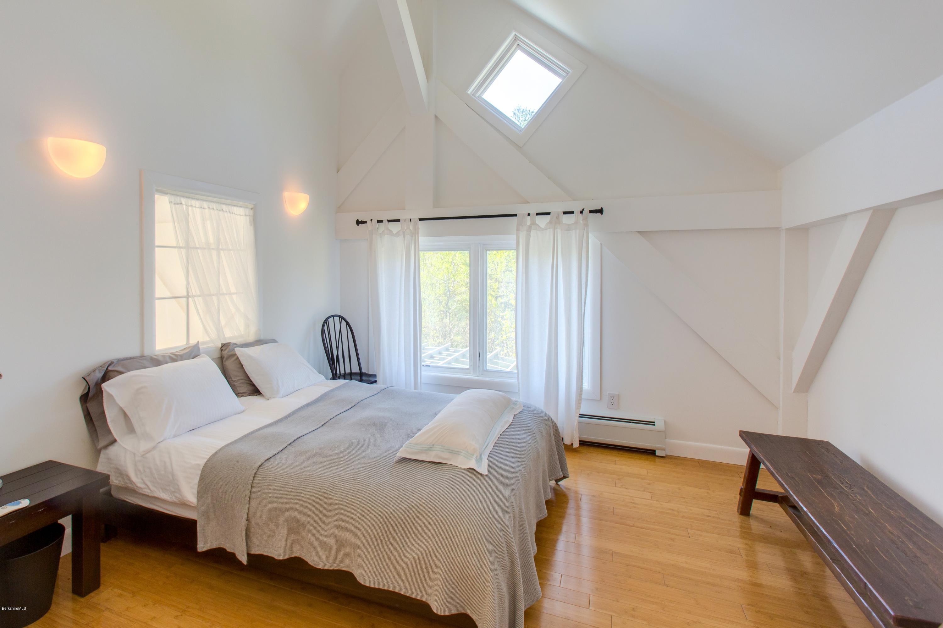 49 New Hartford Road Sandisfield, MA 01255 - Photo 24 of 41 a bedroom with a bed and a window