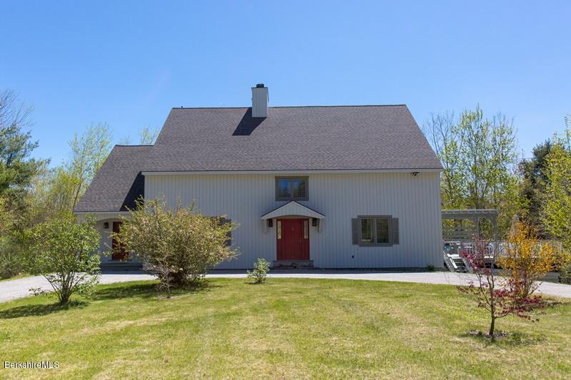 49 New Hartford Road Sandisfield, MA 01255 - Photo 4 of 41 a house view with swimming pool in front of it