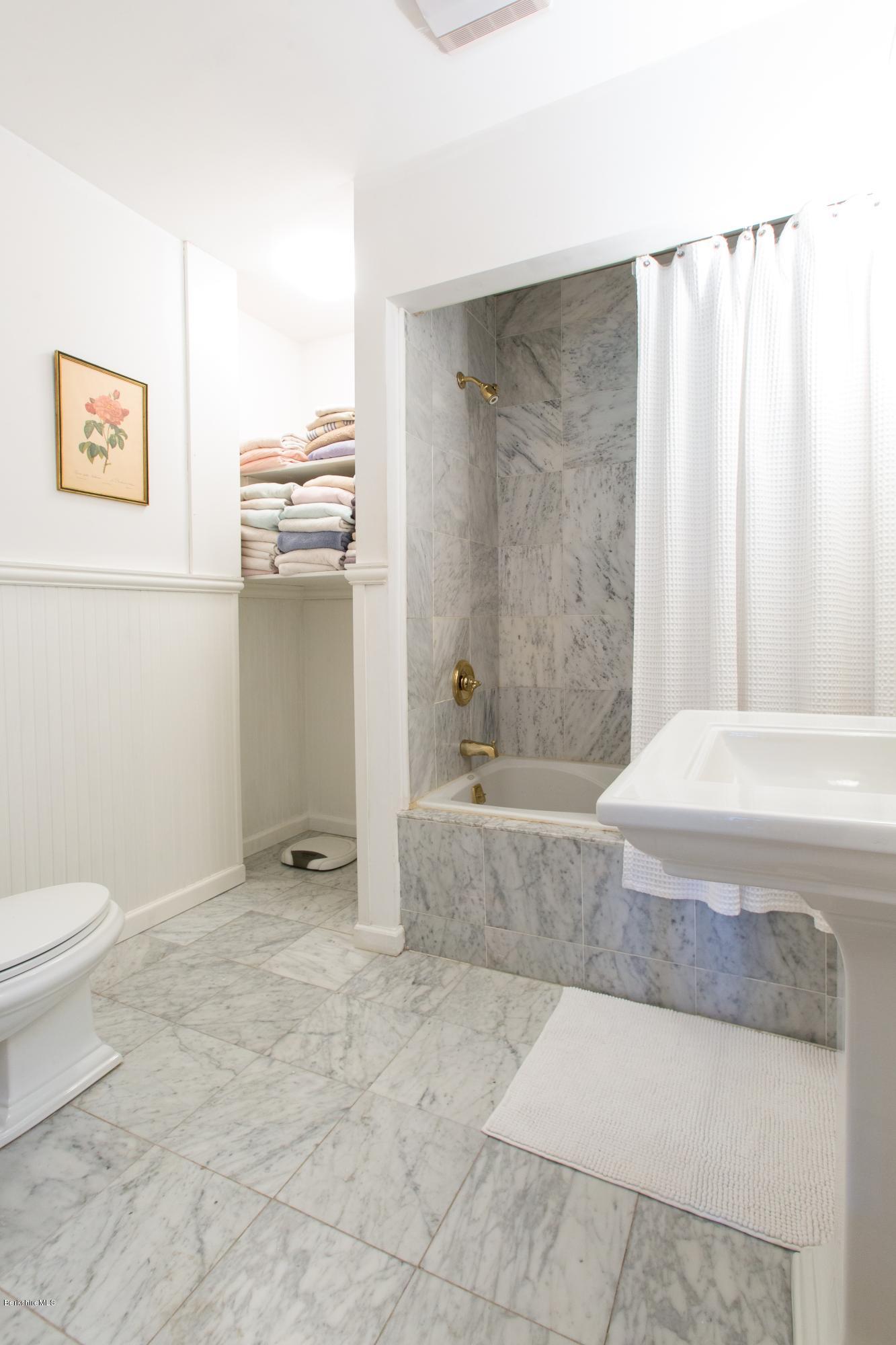 49 New Hartford Road Sandisfield, MA 01255 - Photo 35 of 41 a spacious bathroom with a bathtub and shower