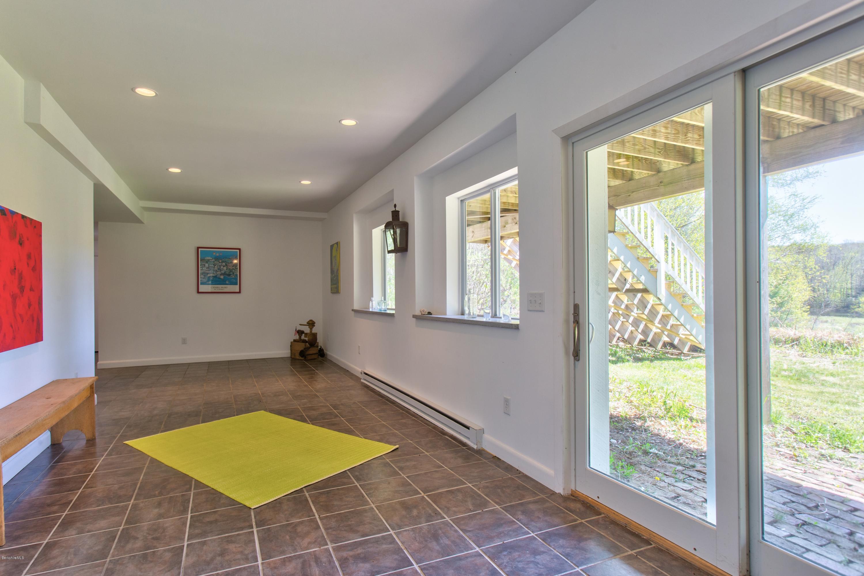49 New Hartford Road Sandisfield, MA 01255 - Photo 38 of 41 a view of a room with furniture and a window