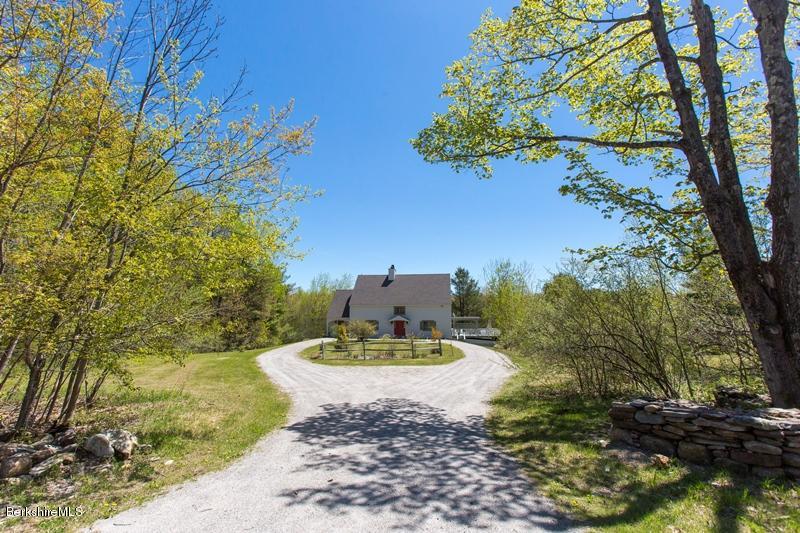 49 New Hartford Road Sandisfield, MA 01255 - Photo 41 of 41 a view of a backyard with plants and a tree