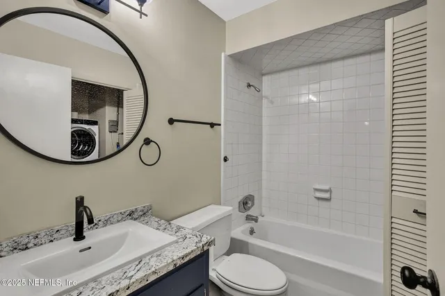 a front view of a house with lots of green space