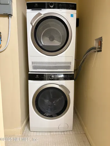 a view of a door with a bench in patio