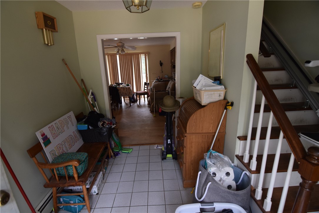 8 Pequot Avenue Westerly, RI 02891 - Photo 11 of 33 Tiled entry foyer with stairs to 2nd floor bedrooms