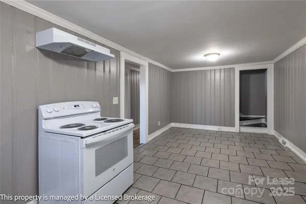 a white refrigerator freezer sitting inside of a kitchen