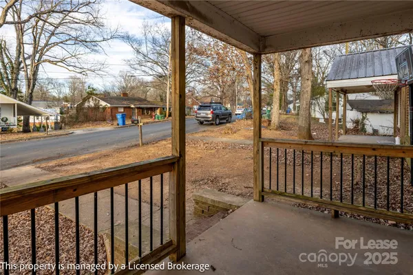 a view of a street from a balcony
