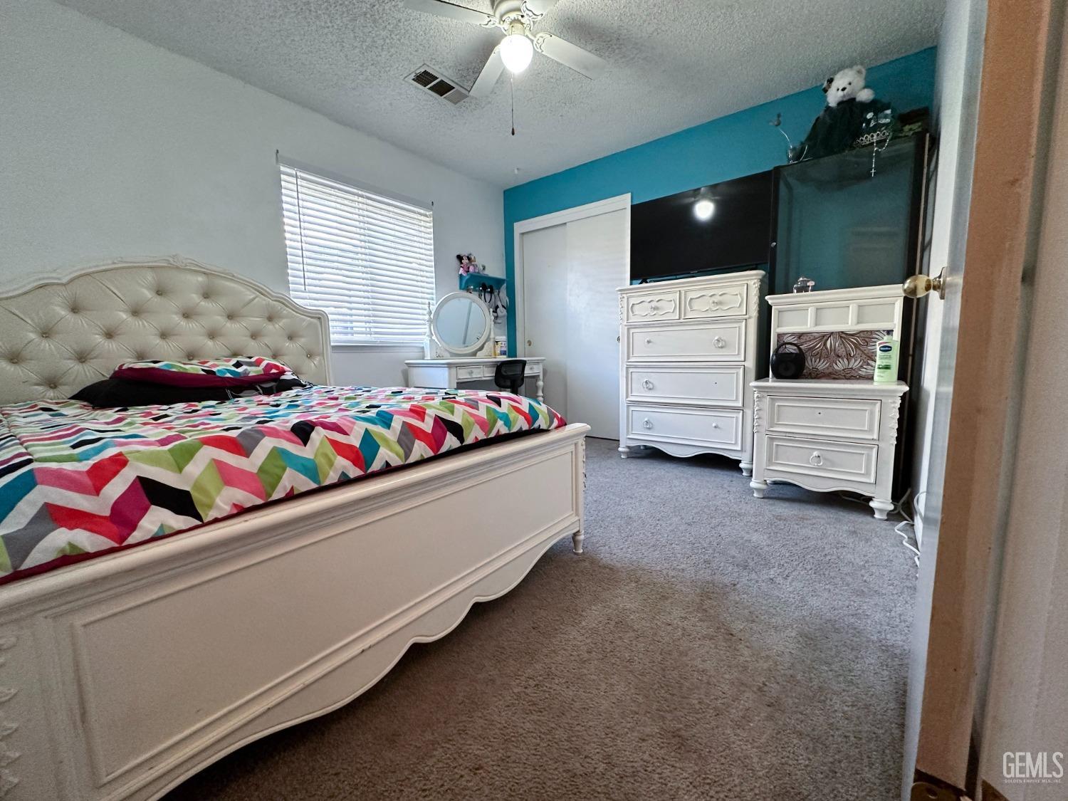 Undisclosed Address Shafter, CA 93263 - Photo 13 of 14 a living room with hard wood floors and a window