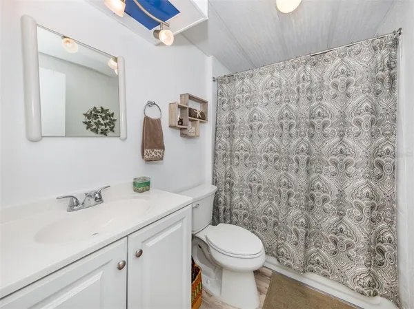 a bathroom with a sink and a toilet