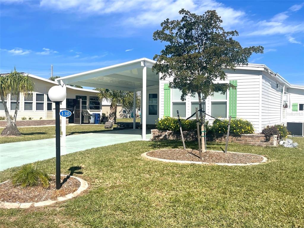 130 Lazy River Road North Port, FL 34287 - Photo 3 of 50 a view of a house with swimming pool