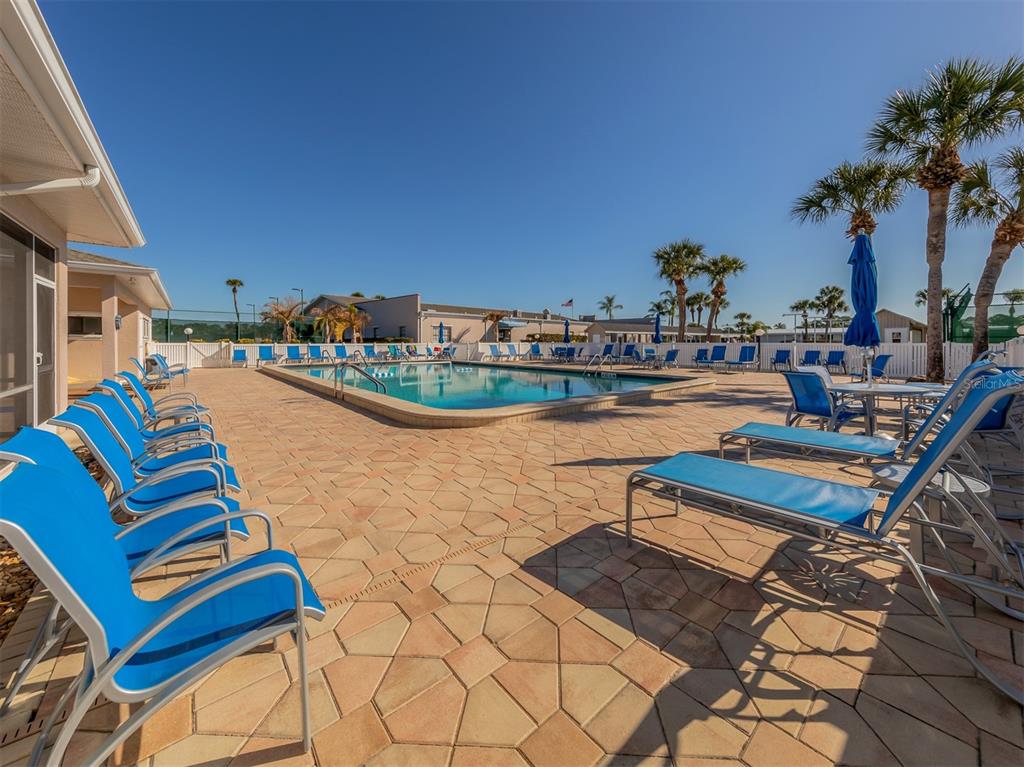 130 Lazy River Road North Port, FL 34287 - Photo 35 of 50 a balcony with chairs and a table