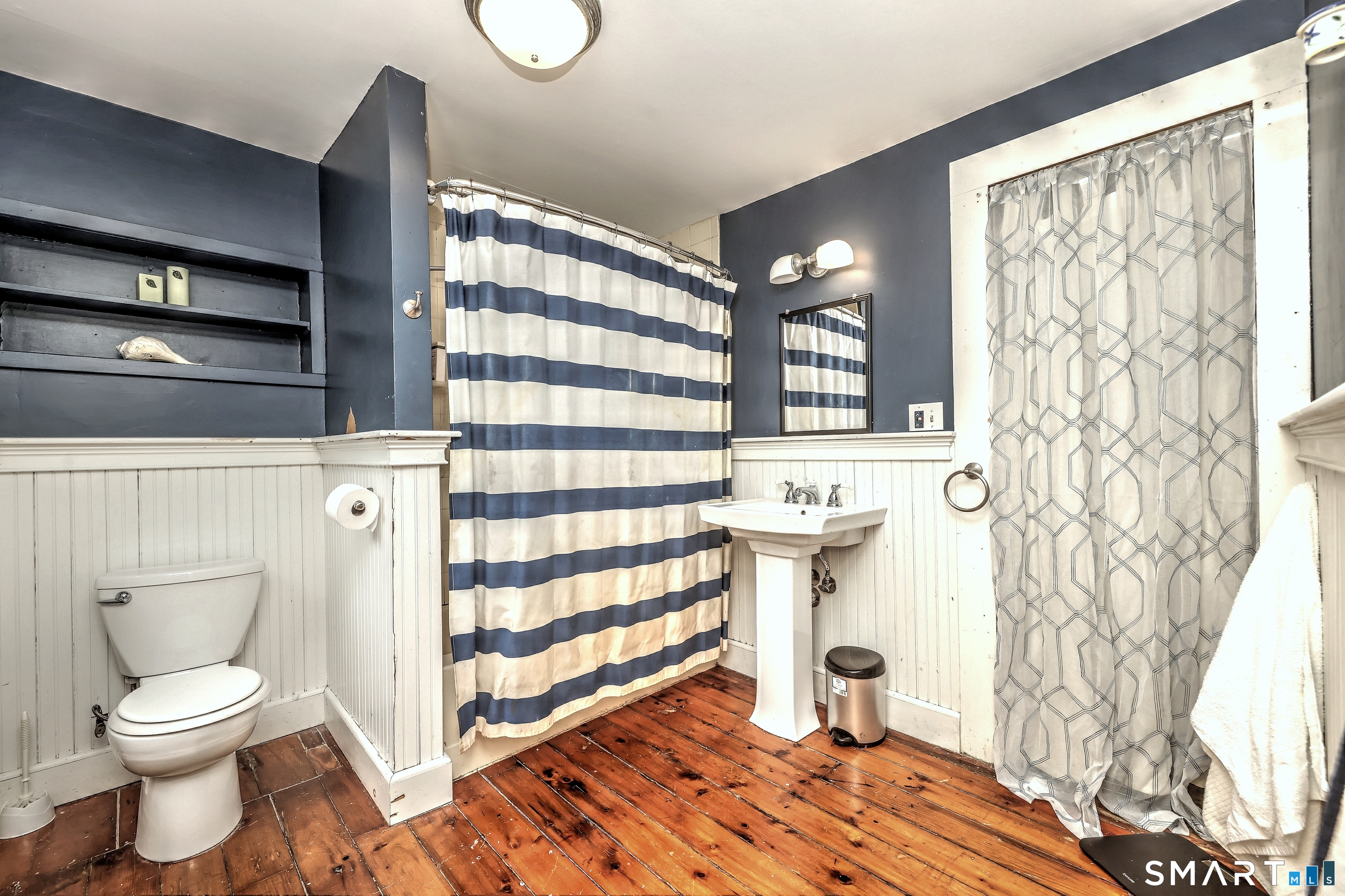 186 Jones Hill Road West Haven, CT 06516 - Photo 31 of 33 a bathroom with a sink toilet and shower