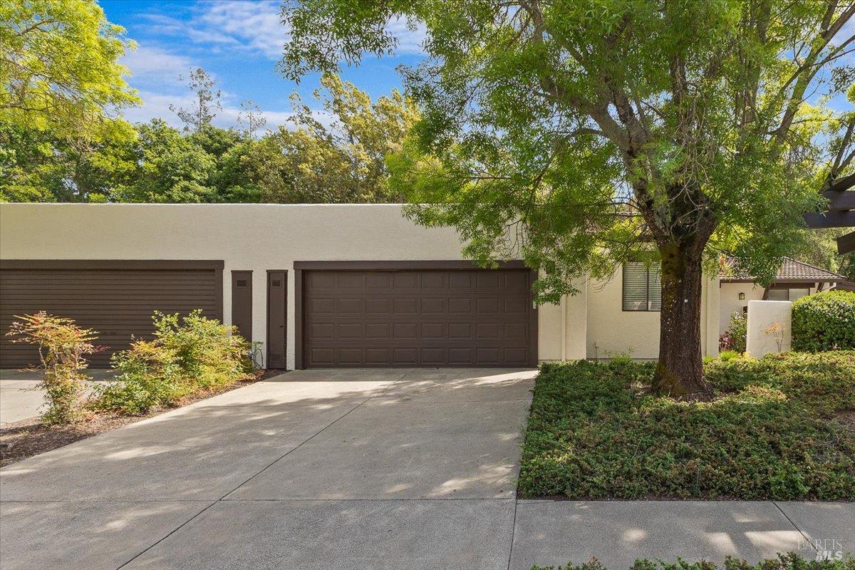 920 Shady Oak Drive Santa Rosa, CA 95404 - Photo 1 of 37 a view of a house with a yard and potted plants
