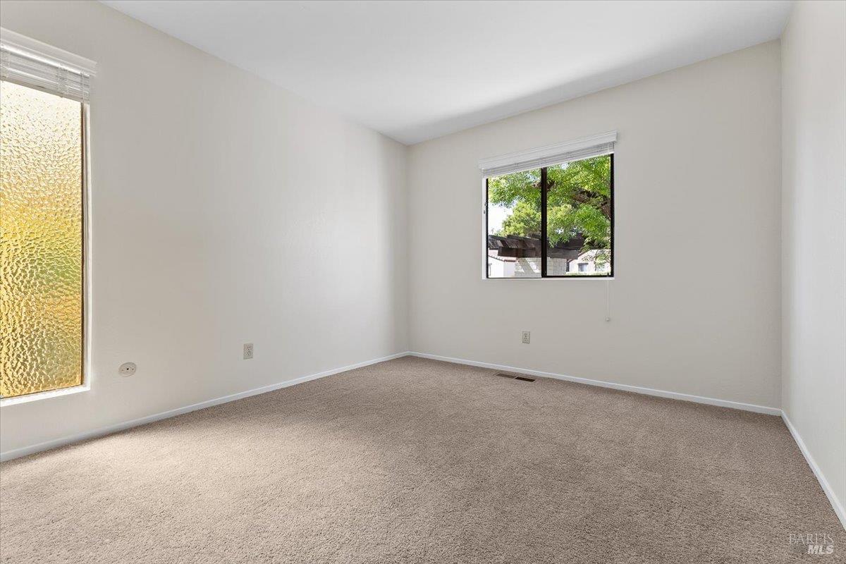 920 Shady Oak Drive Santa Rosa, CA 95404 - Photo 16 of 37 an empty room with a window