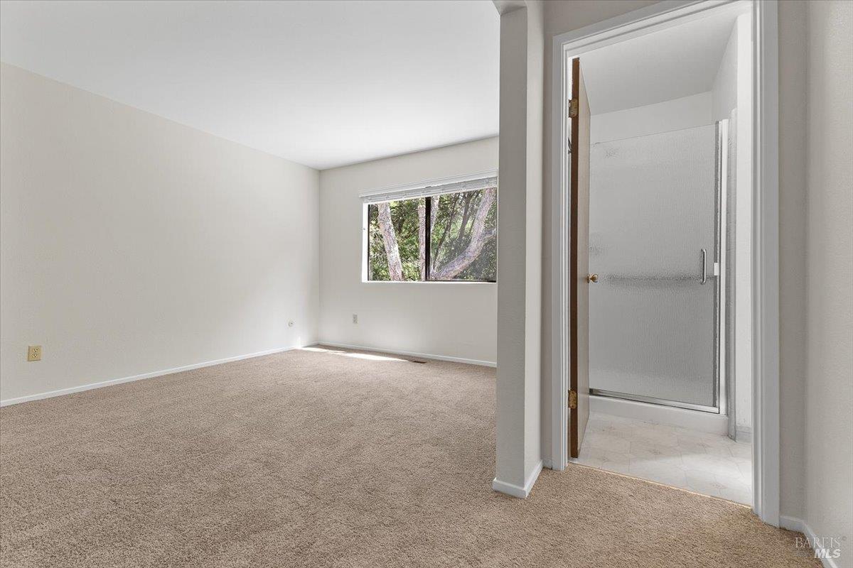 920 Shady Oak Drive Santa Rosa, CA 95404 - Photo 22 of 37 an empty room with windows