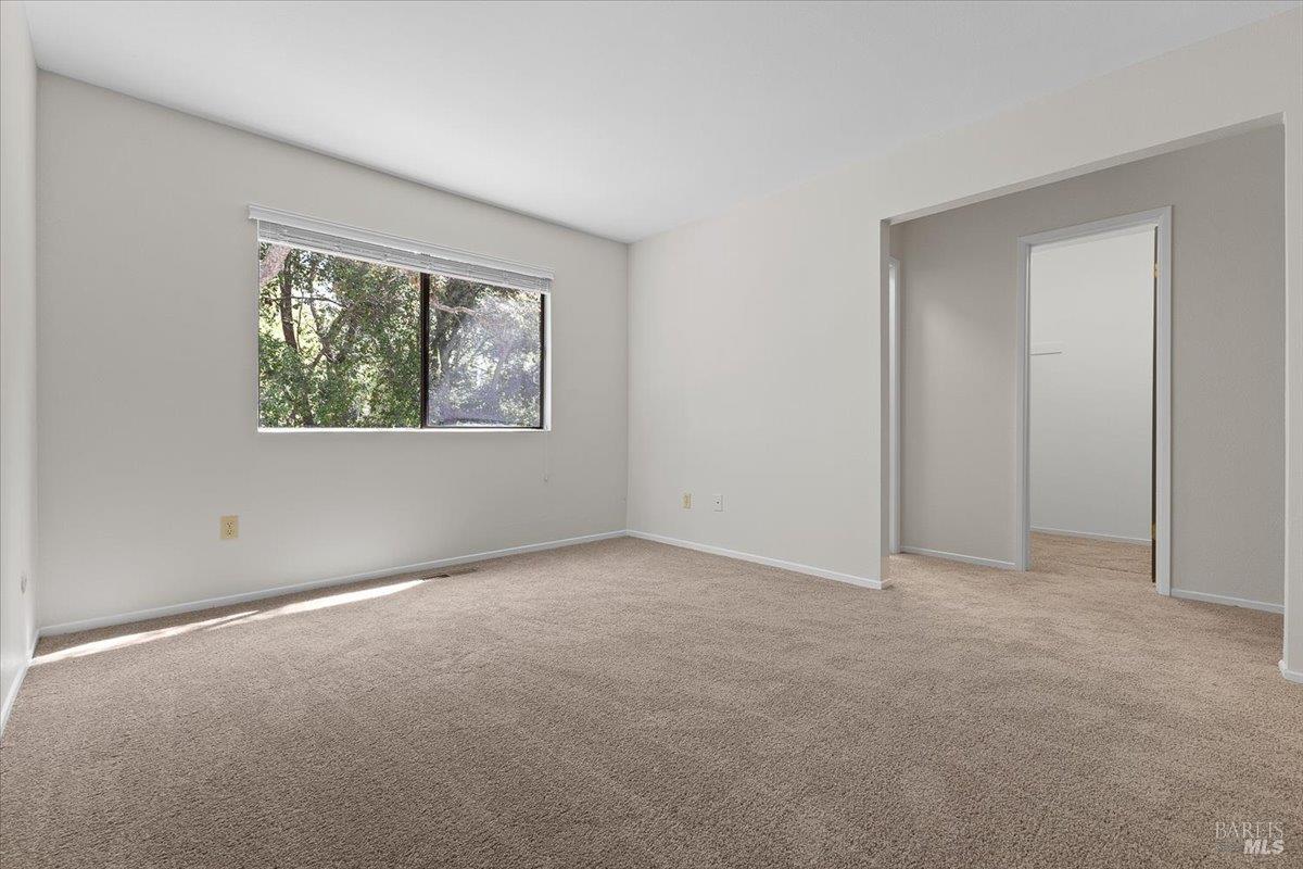 920 Shady Oak Drive Santa Rosa, CA 95404 - Photo 24 of 37 an empty room with windows