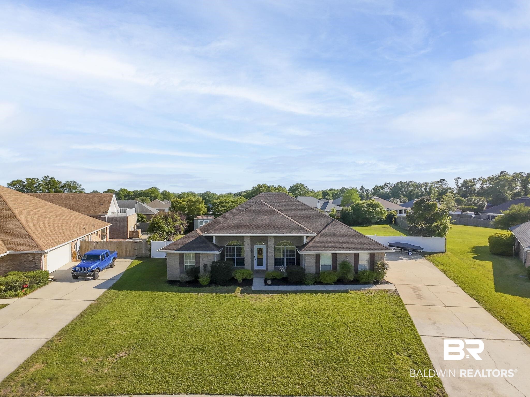 16358 Tempest Drive Foley, AL 36535 - Photo 4 of 46 View of front of home featuring concrete driveway, a front lawn, a residential view, and a shingled roof