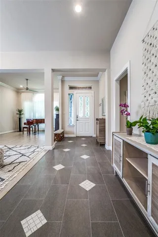 a view of a kitchen with furniture and a stove