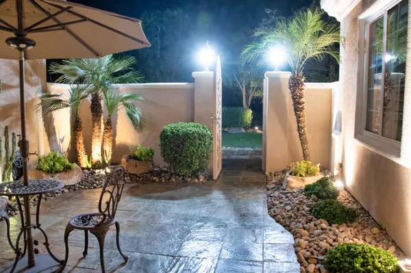 a living room with furniture potted plant and a window