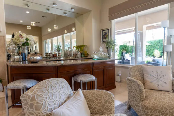 a living room with a bed and a couch