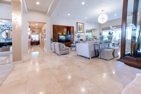 a large spacious bathroom with a large tub and shower
