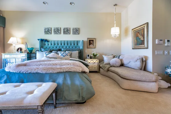 a view of a kitchen with a stove and a microwave