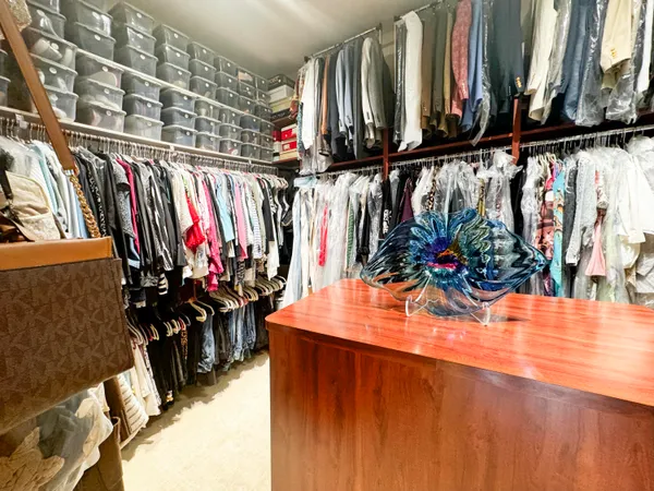 a living room filled with furniture hardwood floor and a window