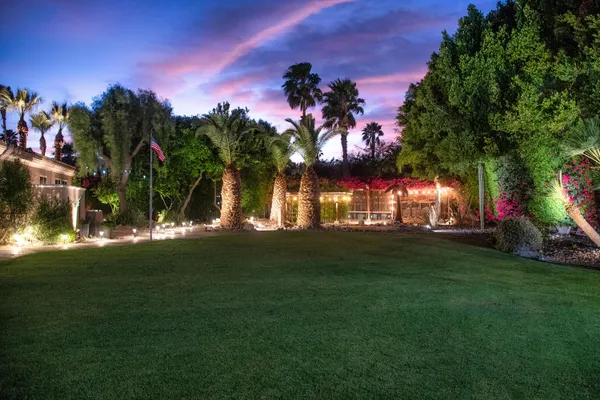 a view of a yard with a fountain