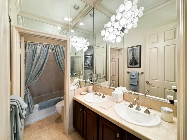 a front view of a house with a yard and a garage