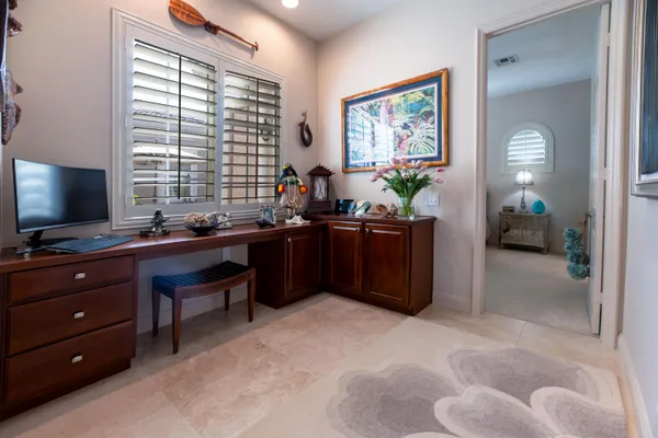 an aerial view of residential house with swimming pool and outdoor space