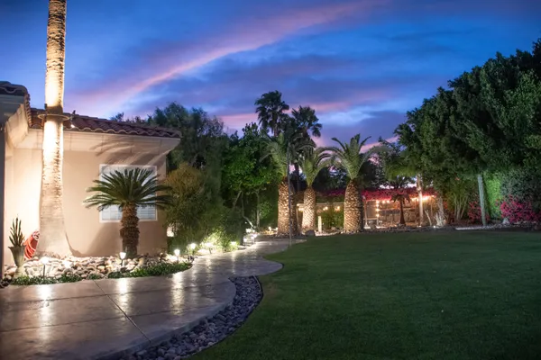 a lobby with furniture and garden view