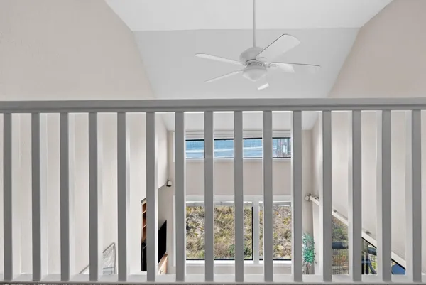 a kitchen with granite countertop a sink and cabinets