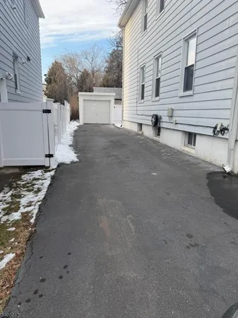 a view of a house with backyard