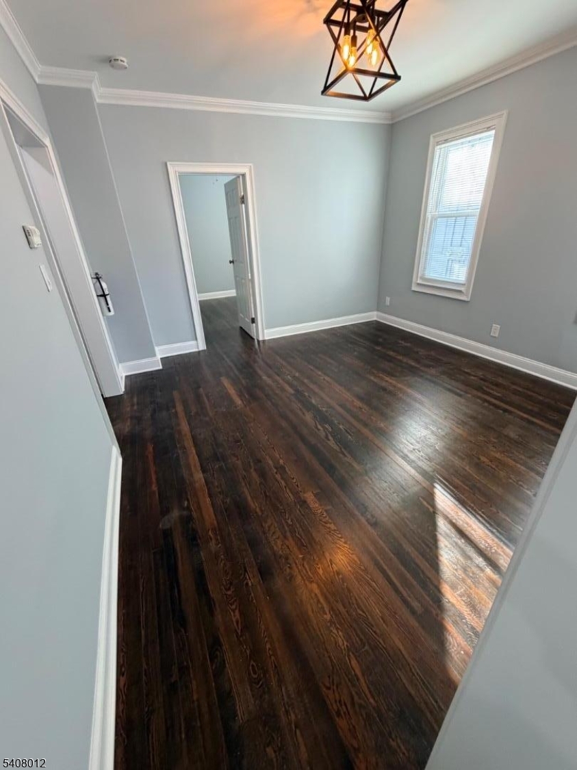 46 High Street, Unit 1 Clifton, NJ 07014 - Photo 7 of 14 a view of entryway and hall with wooden floor