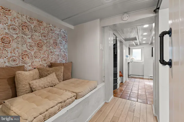 a bathroom with a bathtub and shower