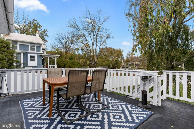 a view of a chairs and table in the patio
