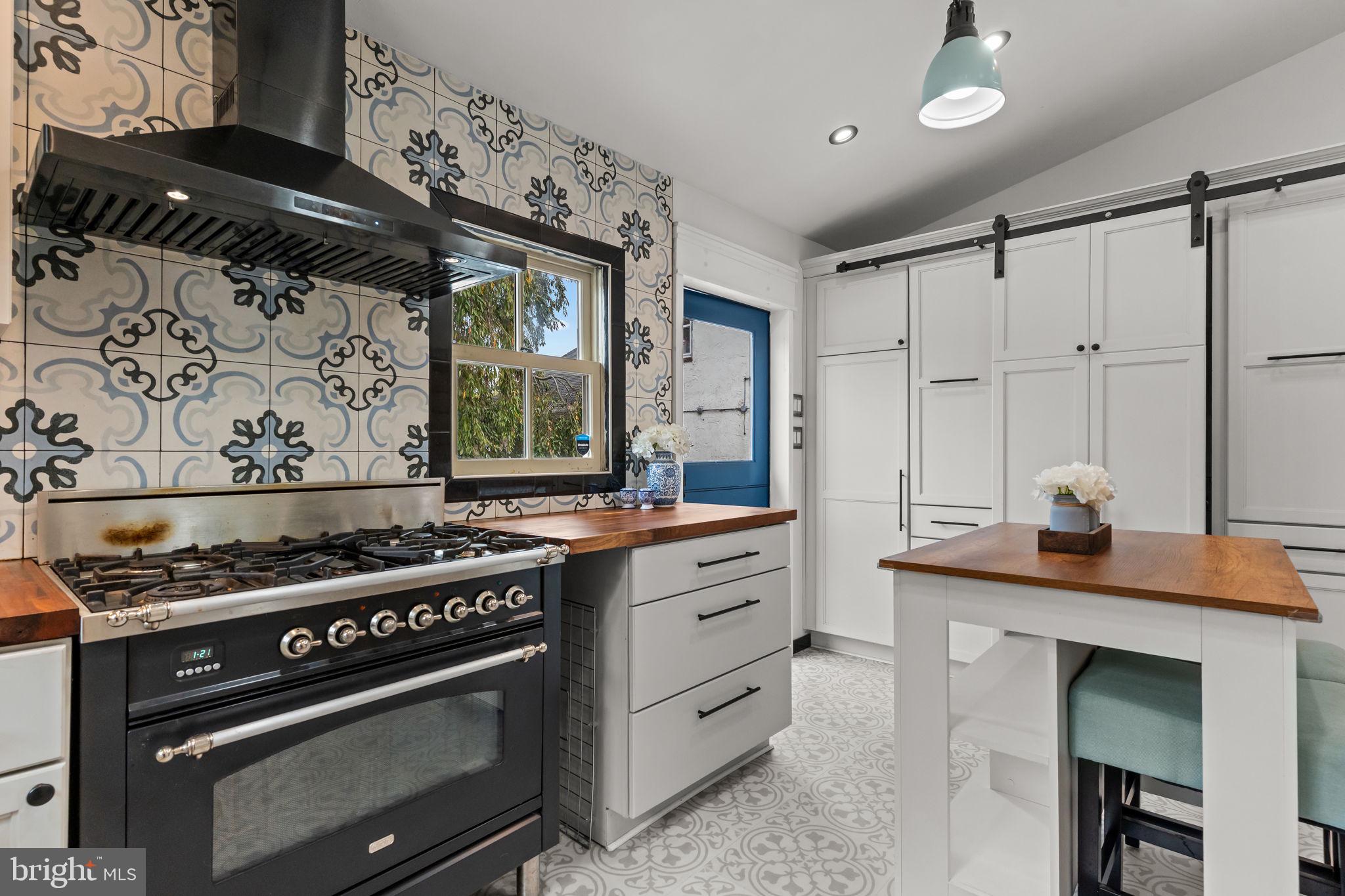2565 Bogarts Tavern Road Doylestown, PA 18902 - Photo 7 of 31 a kitchen with stainless steel appliances a stove and a refrigerator