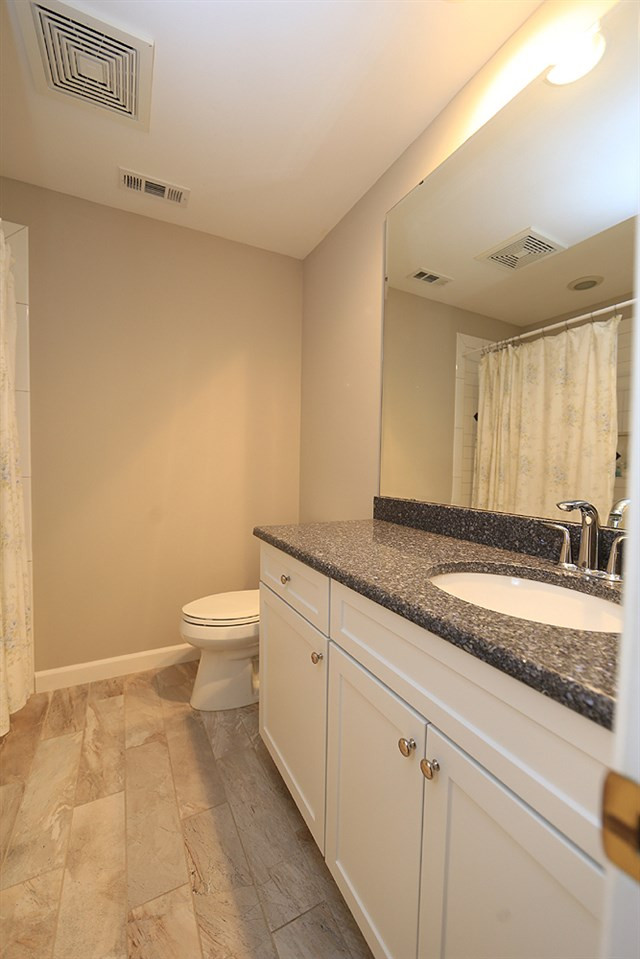 4005 Picardy Drive Raleigh, NC 27612 - Photo 7 of 19 The Hall Bathroom also got a makeover! Beautiful Granite vanity top and tile floor! Tub/Shower also has new tile. Bathroom