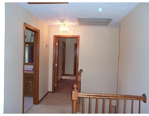 73 Heywood Road Sterling, MA 01564 - Photo 11 of 14 a view of hallway with stairs