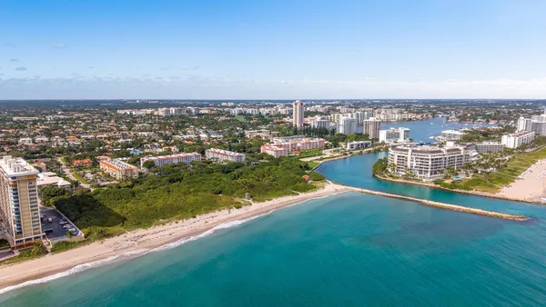 an aerial view of residential building and lake view