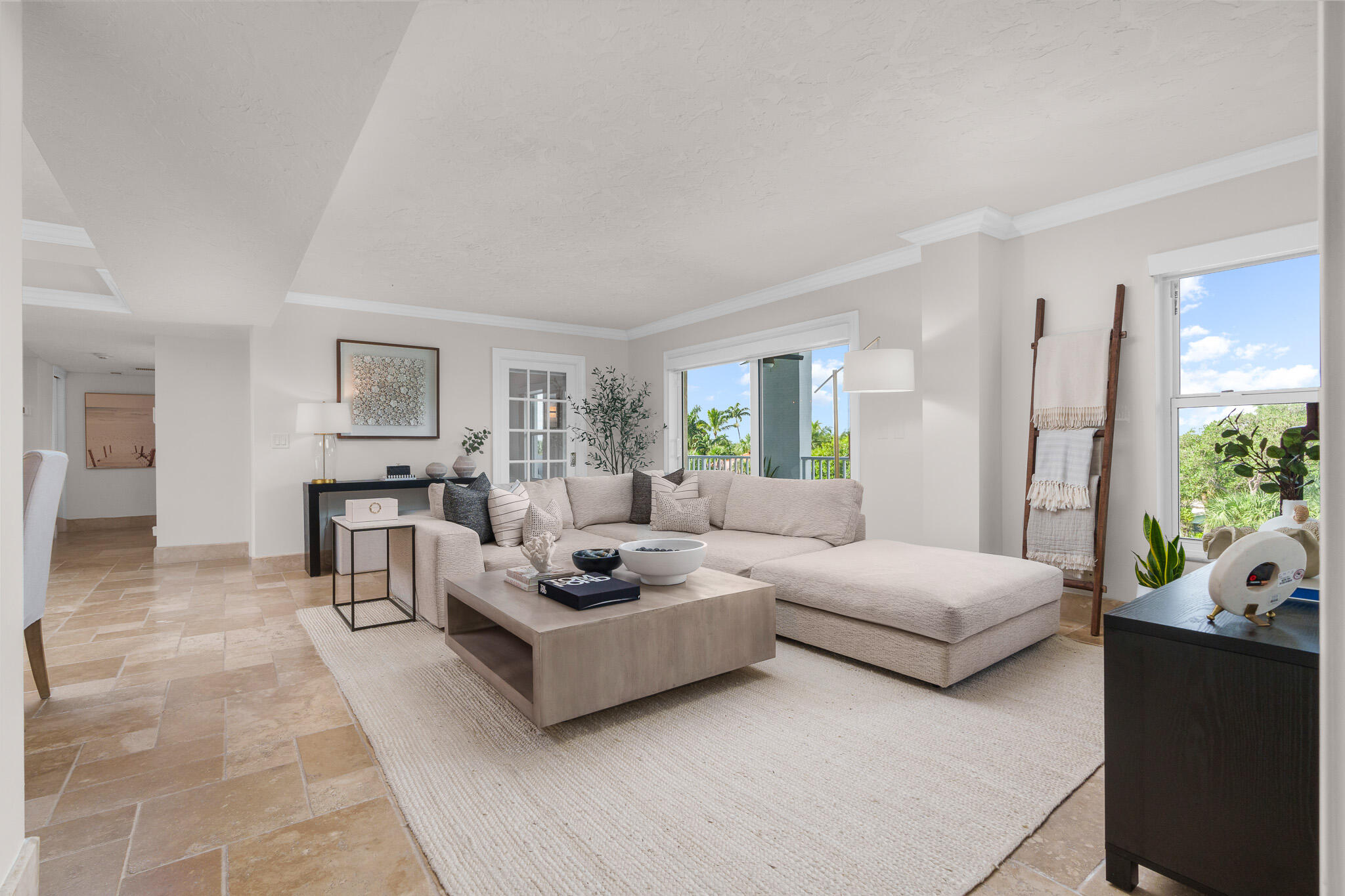 1111 South Ocean Boulevard, Unit 417 Boca Raton, FL 33432 - Photo 3 of 47 a living room with furniture and a large window