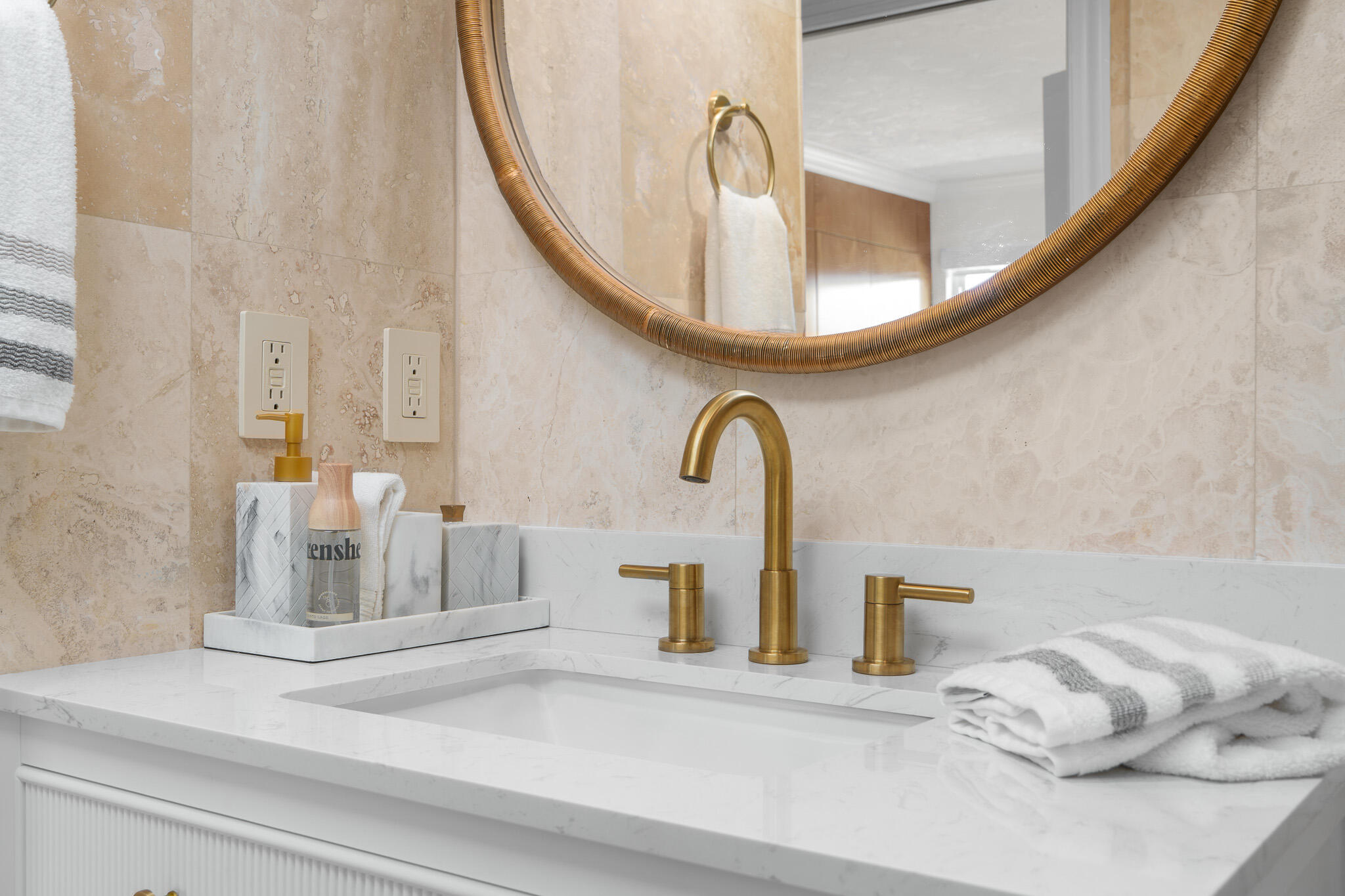 1111 South Ocean Boulevard, Unit 417 Boca Raton, FL 33432 - Photo 37 of 47 a bathroom with a mirror and a sink