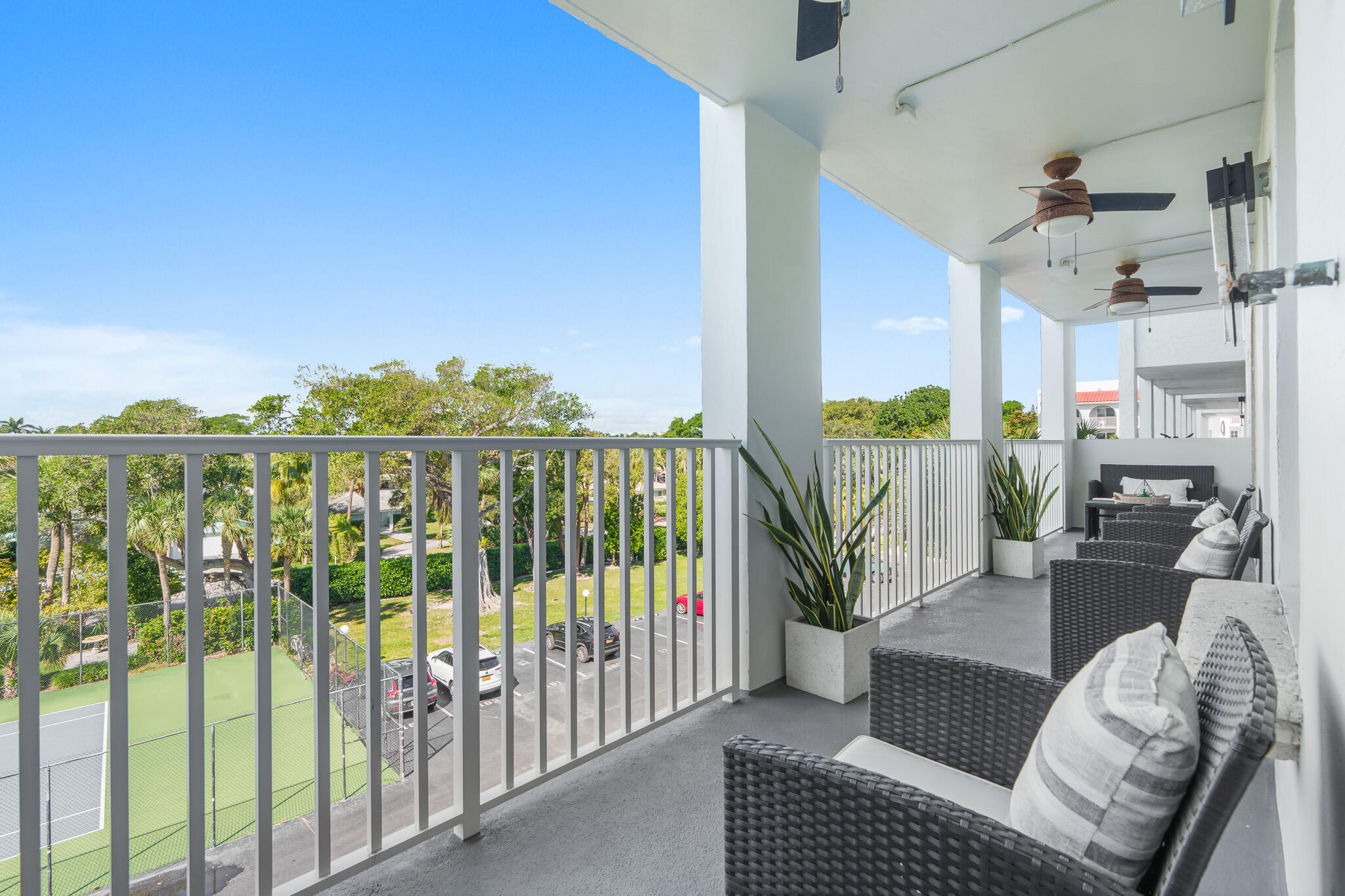 1111 South Ocean Boulevard, Unit 417 Boca Raton, FL 33432 - Photo 40 of 47 a view of a balcony with furniture