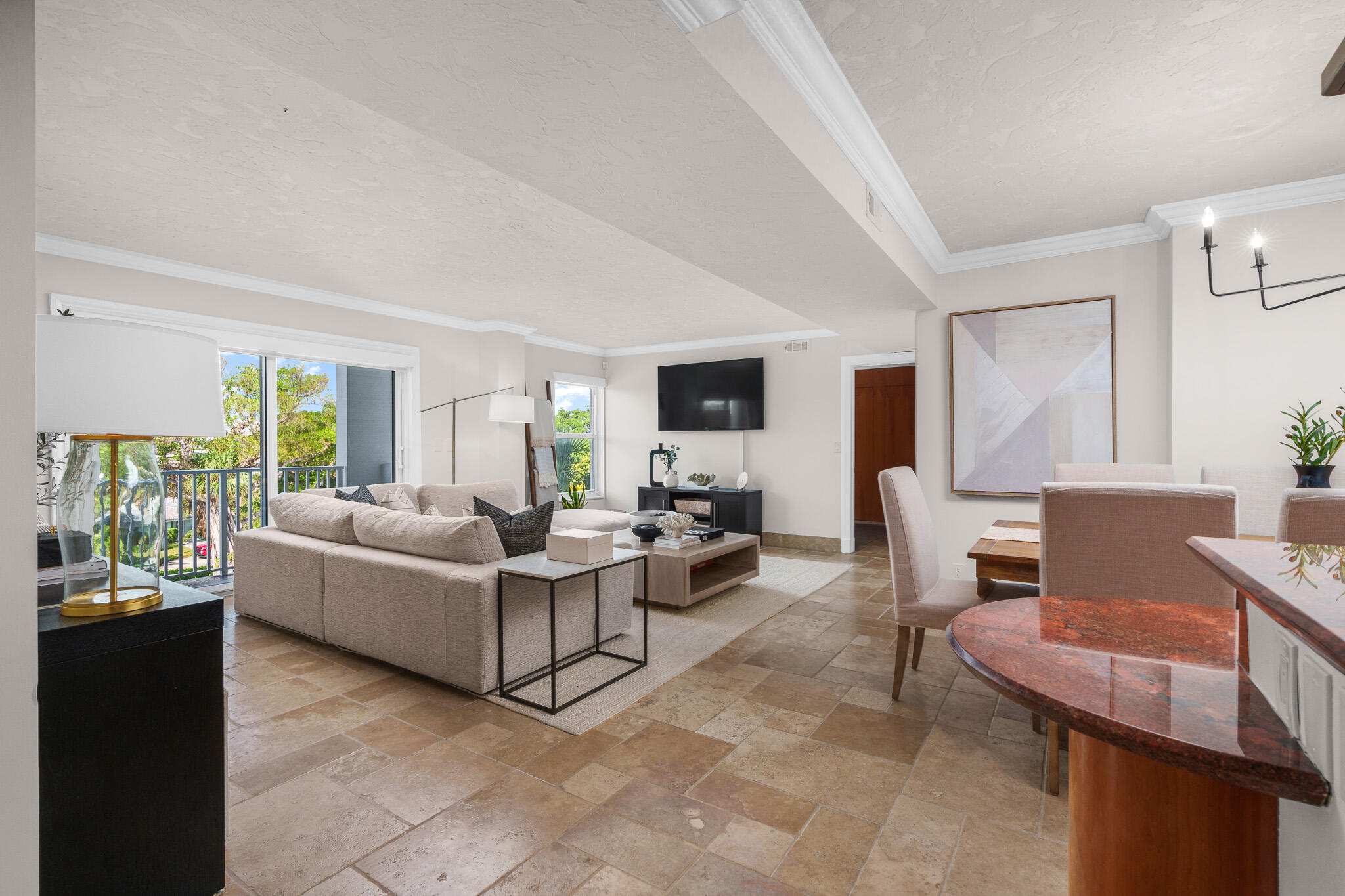 1111 South Ocean Boulevard, Unit 417 Boca Raton, FL 33432 - Photo 4 of 47 a living room with furniture and a large window